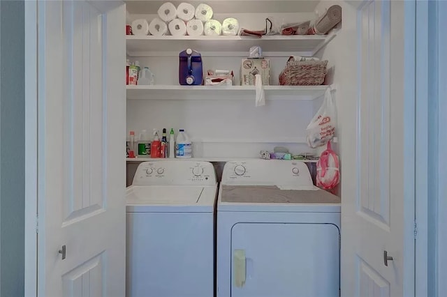 washroom featuring independent washer and dryer