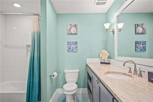 full bathroom featuring tile patterned flooring, vanity, toilet, and shower / tub combo