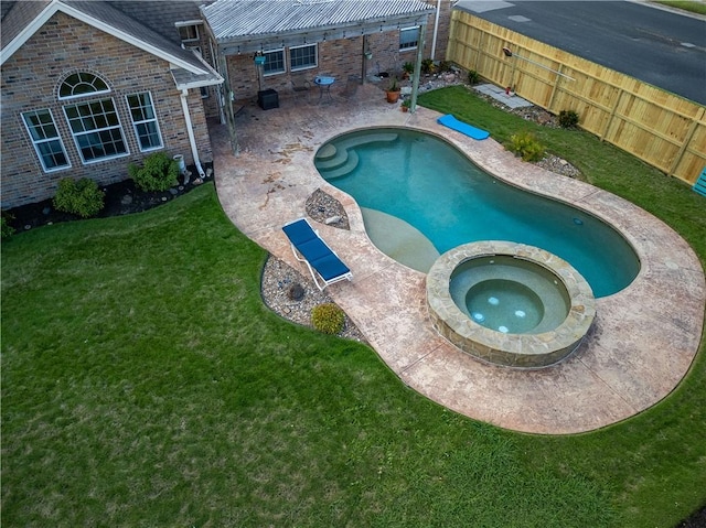 7602 Beau Terre, Corpus Christi, TX 78414 - view of pool featuring a fenced backyard, a pool with connected hot tub, and a patio area