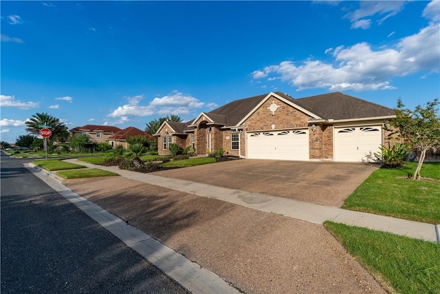 7602 Beau Terre, Corpus Christi, TX 78414 - ranch-style home featuring a garage, concrete driveway, and brick siding