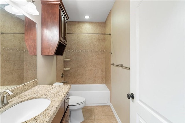 full bathroom featuring vanity, toilet, baseboards, bathing tub / shower combination, and tile patterned floors