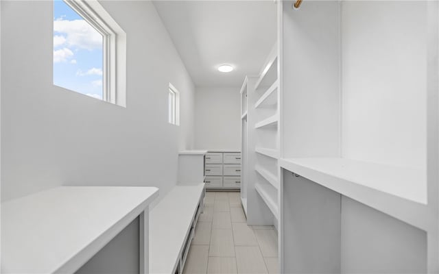 714 Papa Mori Dr, Corpus Christi, TX 78415 - spacious closet with light tile patterned floors