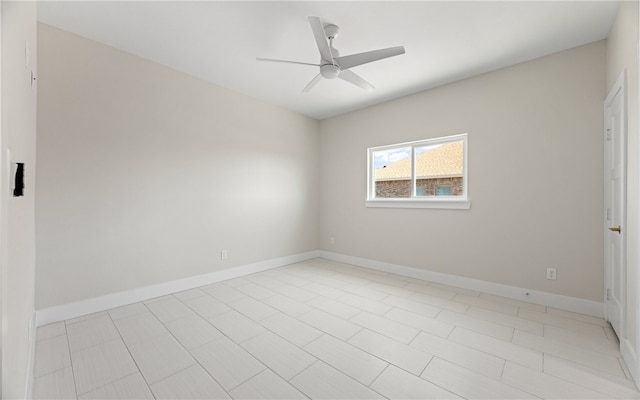 714 Papa Mori Dr, Corpus Christi, TX 78415 - empty room featuring a ceiling fan and baseboards