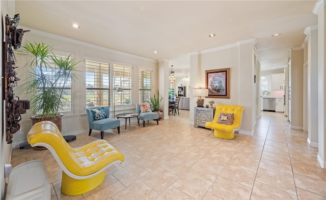 living area featuring light tile patterned floors and crown molding