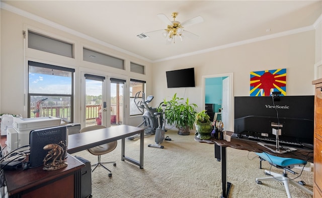 carpeted office featuring crown molding, ceiling fan, and french doors