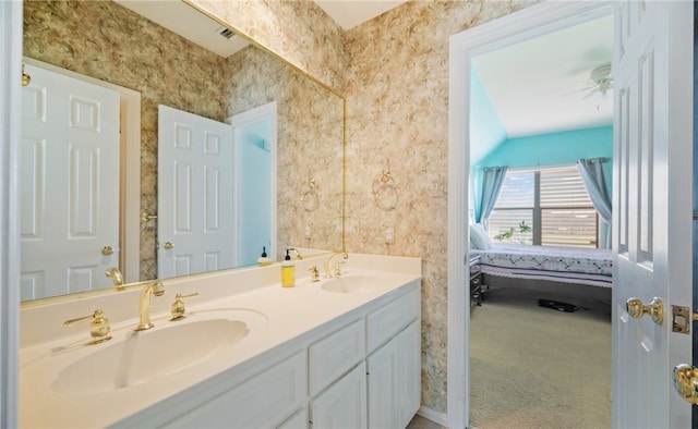 bathroom featuring vanity and ceiling fan