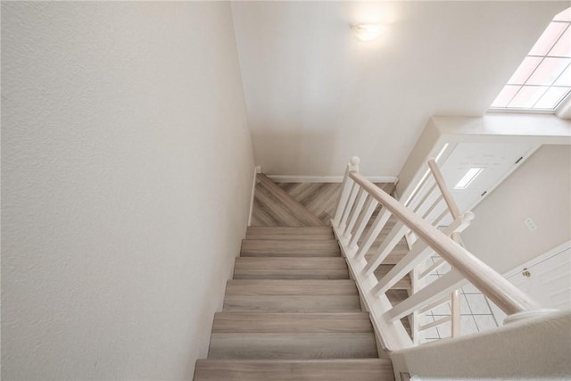 stairway with baseboards