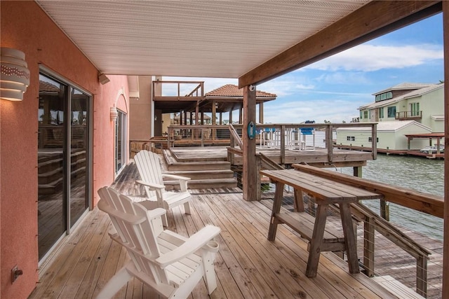 dock area with a water view