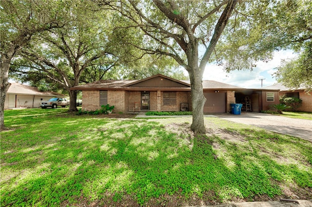 908 Johnson St, Woodsboro, TX 78393 - single story home with a garage and a front yard
