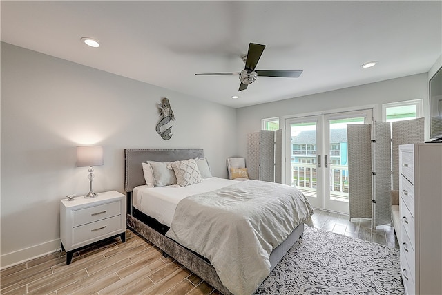 bedroom featuring access to outside, french doors, ceiling fan, and light wood-type flooring