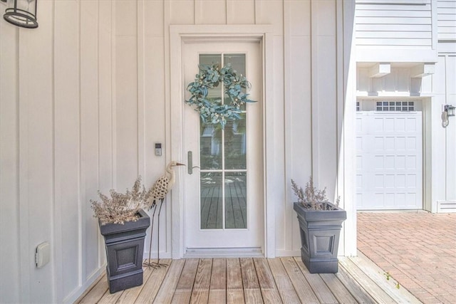 property entrance with board and batten siding