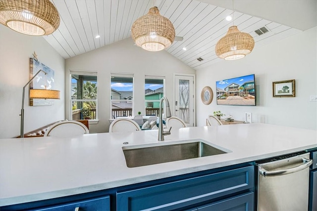 kitchen featuring blue cabinets, wood ceiling, visible vents, and a sink