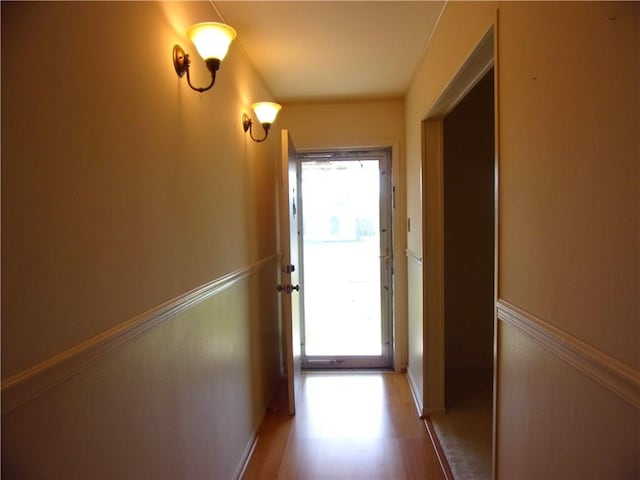 hall featuring wood finished floors