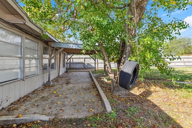 view of yard featuring a carport