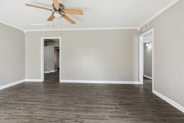 empty room with ceiling fan, dark hardwood / wood-style floors, and crown molding