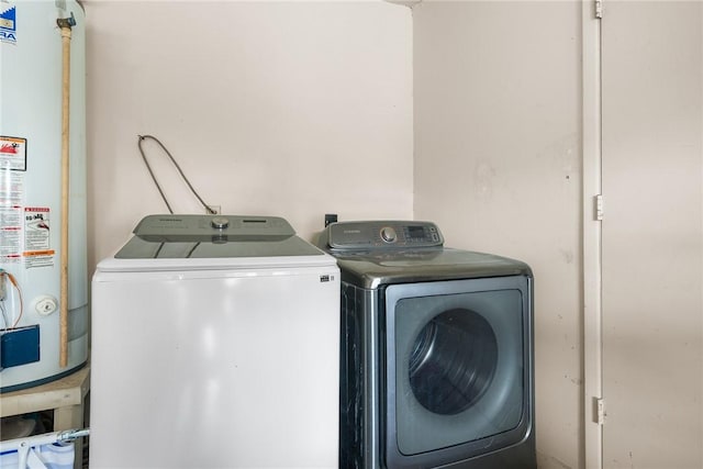 3713 Tripoli Dr, Corpus Christi, TX 78415 - laundry room with water heater and washer and dryer