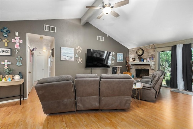 3713 Tripoli Dr, Corpus Christi, TX 78415 - living area featuring ceiling fan, light wood-style floors, and a brick fireplace
