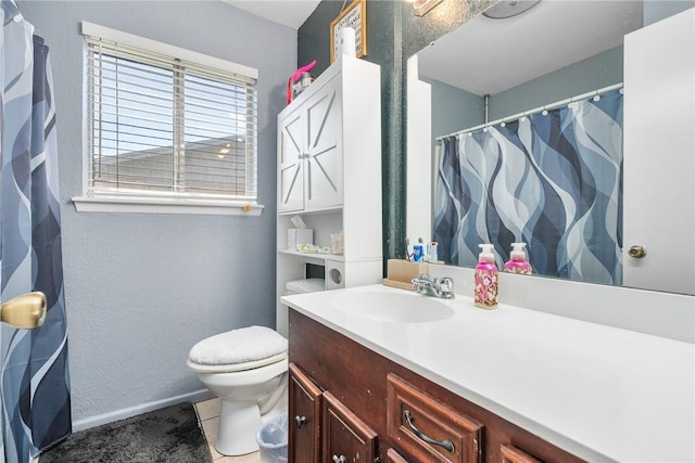 3713 Tripoli Dr, Corpus Christi, TX 78415 - bathroom featuring vanity, tile patterned flooring, a textured wall, and a shower with shower curtain