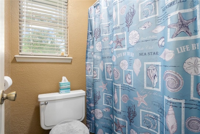 3713 Tripoli Dr, Corpus Christi, TX 78415 - bathroom with a textured wall and a shower with shower curtain
