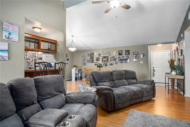3713 Tripoli Dr, Corpus Christi, TX 78415 - living area featuring ceiling fan, light wood-style floors, and high vaulted ceiling
