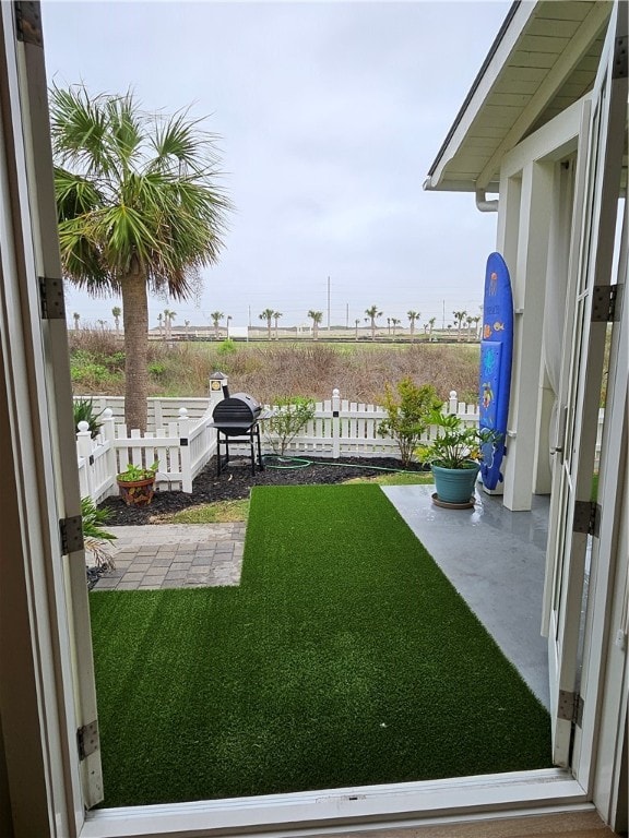 view of yard with a patio area