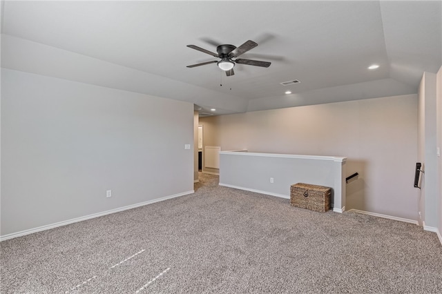 interior space featuring ceiling fan and lofted ceiling