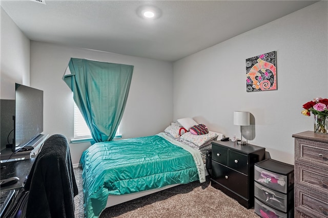 bedroom featuring carpet