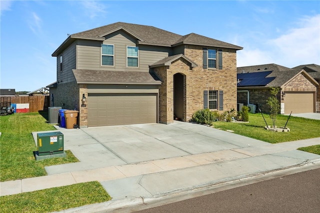 front of property with a garage and a front yard