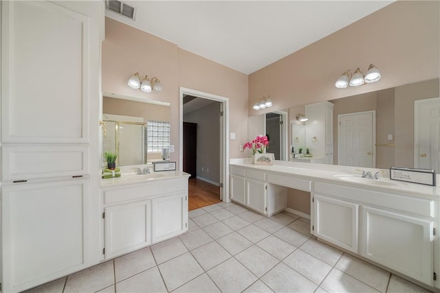 bathroom featuring vanity and tile patterned floors