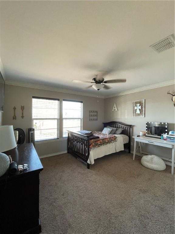 bedroom with visible vents, crown molding, and carpet
