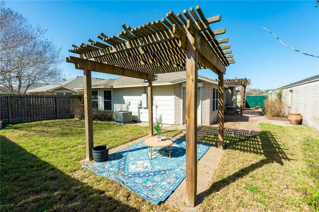 7437 Long S Dr, Corpus Christi, TX 78414 - view of yard with a pergola, central AC unit, and a patio