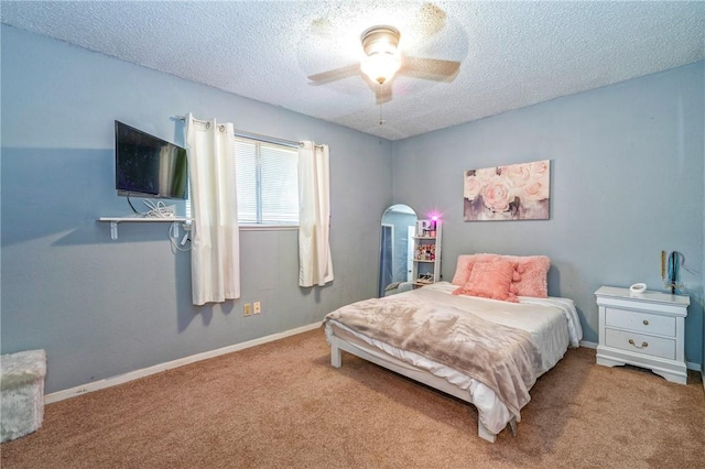 4318 Pecan Bayou Ct, Corpus Christi, TX 78410 - carpeted bedroom with ceiling fan and a textured ceiling