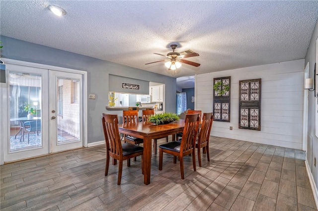 4318 Pecan Bayou Ct, Corpus Christi, TX 78410 - dining space featuring hardwood / wood-style flooring, a textured ceiling, ceiling fan, and french doors
