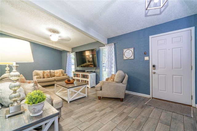 4318 Pecan Bayou Ct, Corpus Christi, TX 78410 - living room with beamed ceiling and a textured ceiling