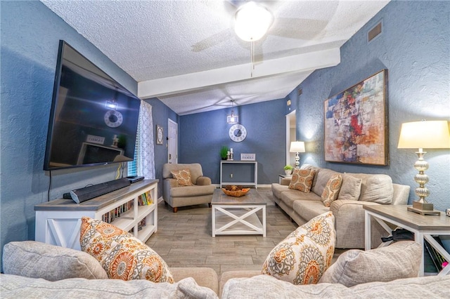 4318 Pecan Bayou Ct, Corpus Christi, TX 78410 - living room with vaulted ceiling with beams, a textured ceiling, and light hardwood / wood-style floors