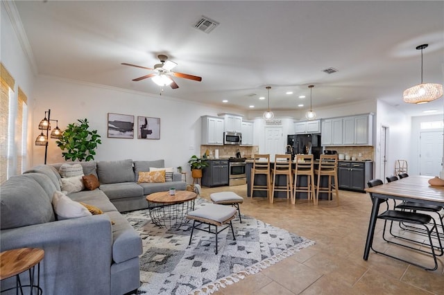 14878 Granada Dr Unit 403, Corpus Christi, TX 78418 - living area featuring ornamental molding, visible vents, ceiling fan, and recessed lighting