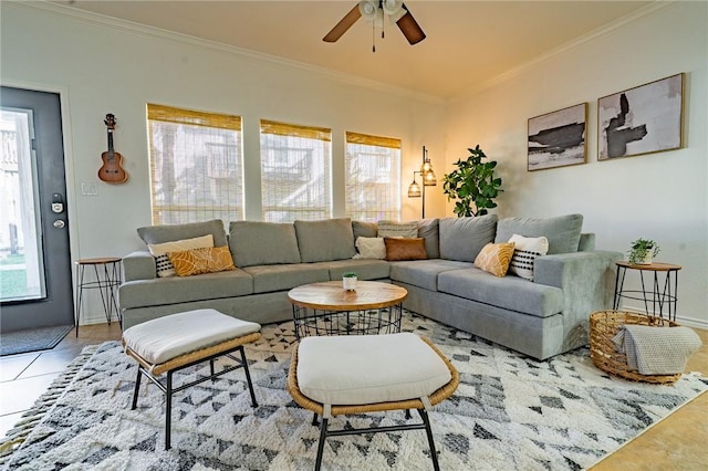 14878 Granada Dr Unit 403, Corpus Christi, TX 78418 - living room featuring ornamental molding, baseboards, a ceiling fan, and tile patterned flooring