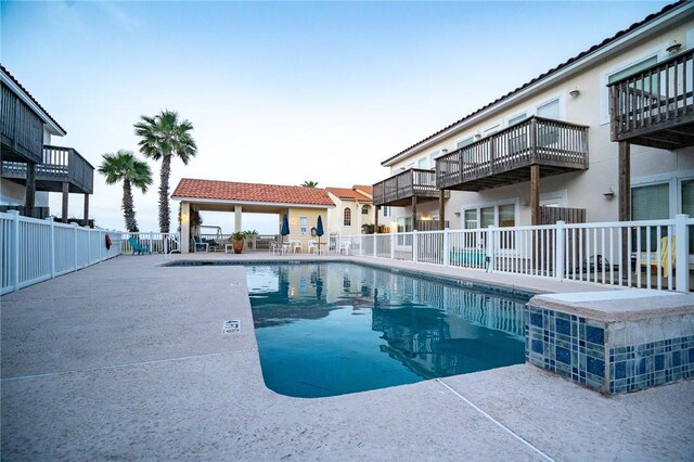 14878 Granada Dr Unit 403, Corpus Christi, TX 78418 - community pool featuring a patio area and fence