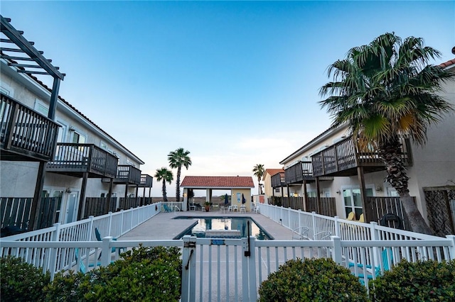 14878 Granada Dr Unit 403, Corpus Christi, TX 78418 - pool featuring a fenced backyard and a patio