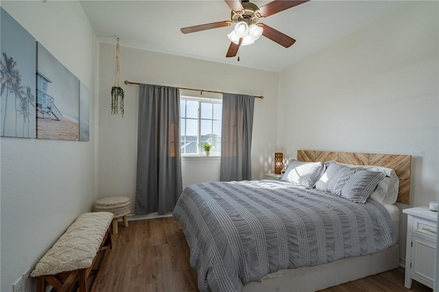 14878 Granada Dr Unit 403, Corpus Christi, TX 78418 - bedroom with wood finished floors and a ceiling fan