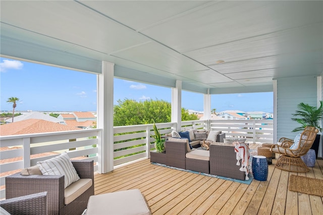 wooden terrace with outdoor lounge area