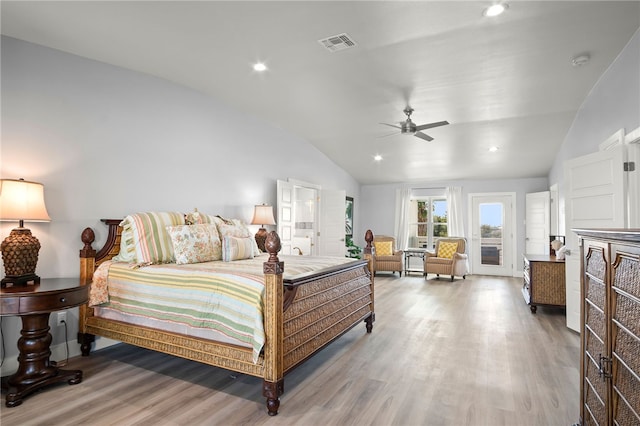 bedroom with ceiling fan, wood-type flooring, and lofted ceiling