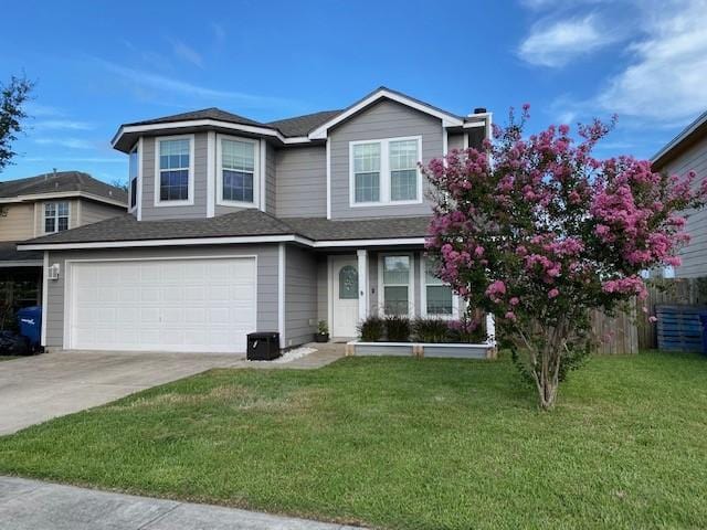 2334 Mystic Star Dr, Corpus Christi, TX 78414 - traditional-style home with driveway, a garage, and roof with shingles