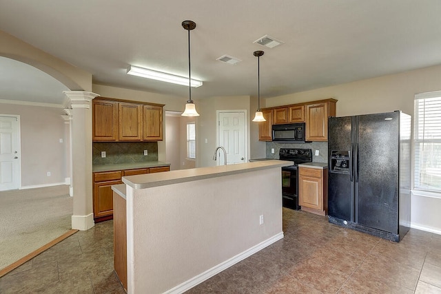 2334 Mystic Star Dr, Corpus Christi, TX 78414 - kitchen featuring black appliances, arched walkways, decorative columns, tasteful backsplash, and crown molding