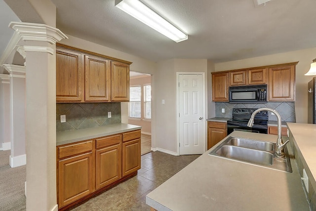 2334 Mystic Star Dr, Corpus Christi, TX 78414 - kitchen with black appliances, backsplash, and light countertops