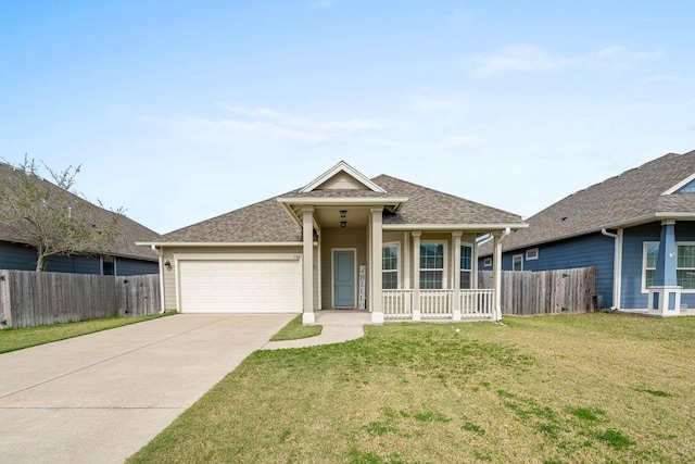 view of front facade featuring covered porch, a front lawn, and a garage