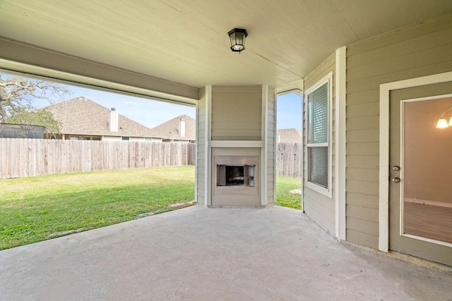 view of patio / terrace featuring exterior fireplace