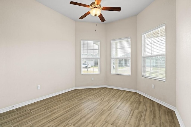 empty room featuring ceiling fan