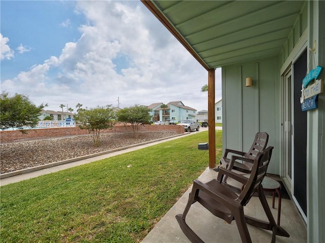 230 Cut Off Rd Unit 129, Port Aransas, TX 78373 - view of grassy yard featuring a residential view