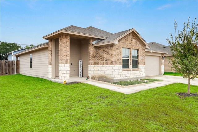 ranch-style home with a garage and a front yard